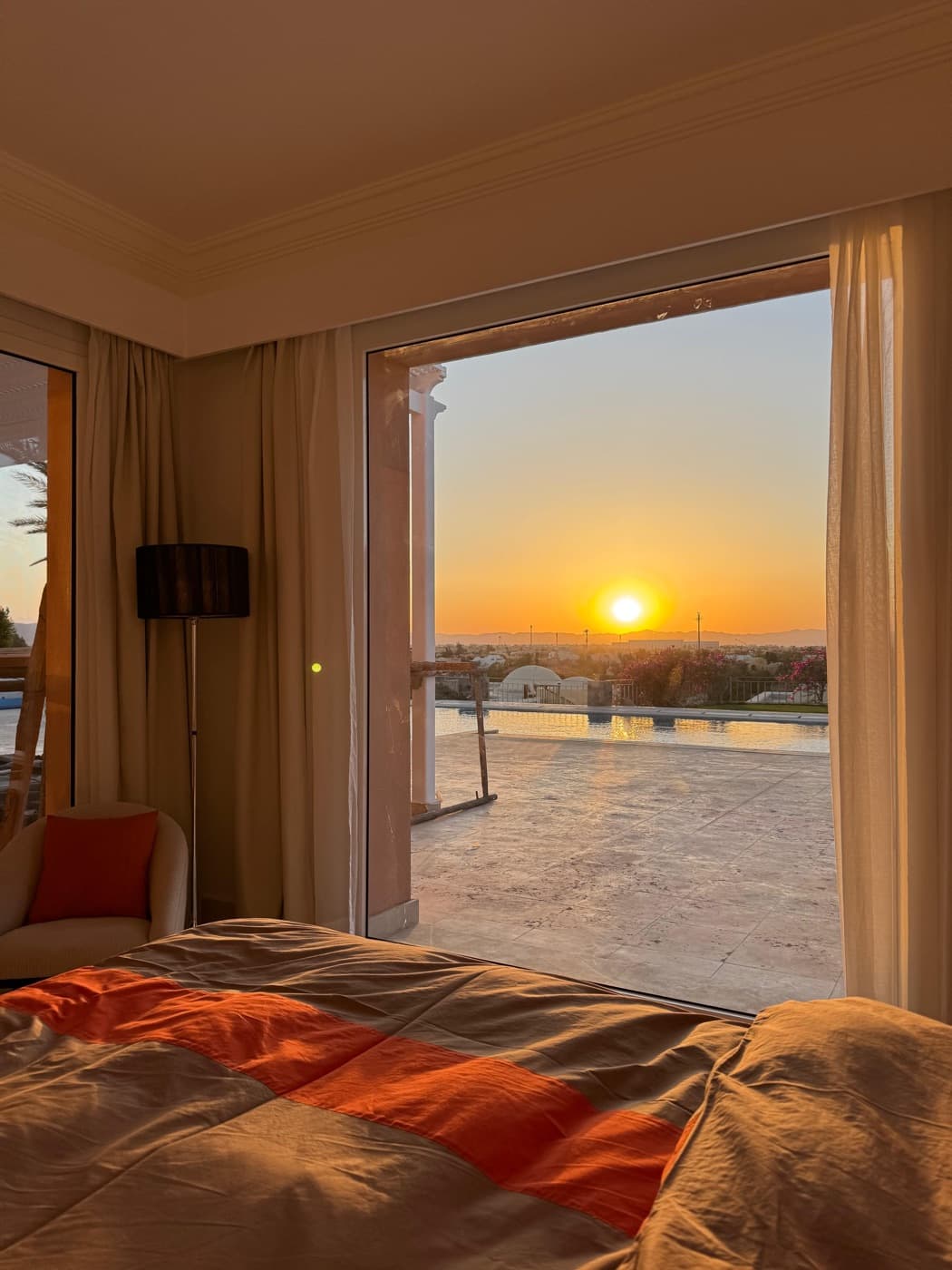 Master bedroom, sunset through the window