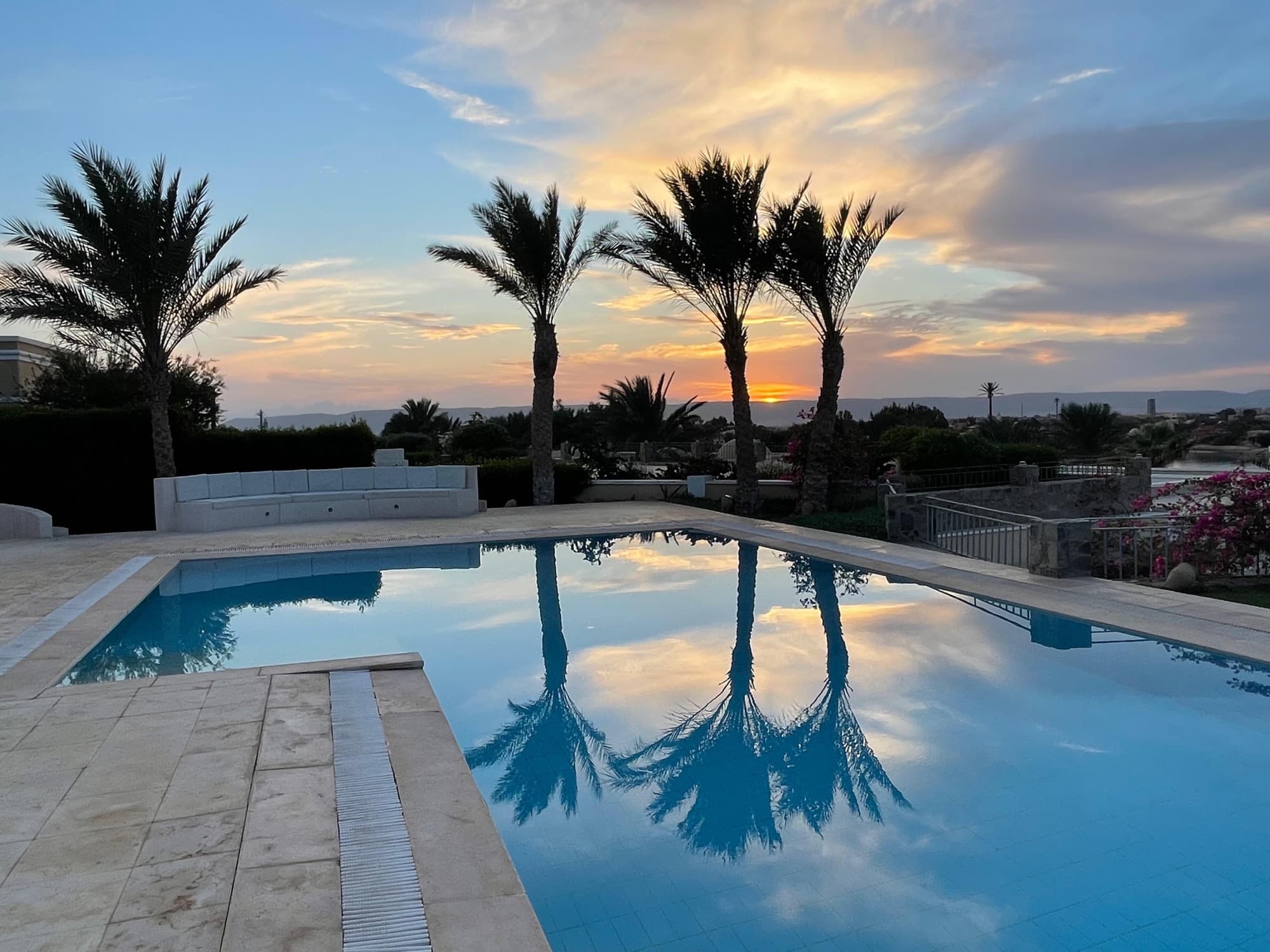 Villa with pool at dusk